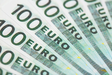 Banknotes 100 euros beautifully laid out. Euro euro money. European Union banking, financial savings.