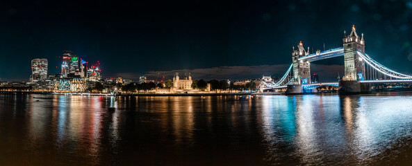 Fototapeta na wymiar Tower Bridge in London, the UK at night. Panorama of the city centre