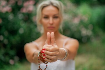 Yogic hand gesture, Kundalini Yoga   , Yogic hand gesture, Kundalini Yoga, Close-up of the hands of a man who meditate inside, focus on hands in the gesture, Yogic hand gesture,  Reiki