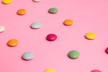 Pattern made of colorful candy. Pink Background.  Sweet.
