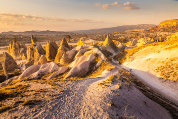 Sunset in Cappadocia with peaked mountains