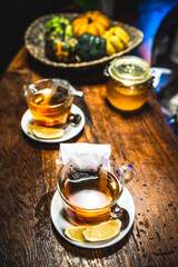 hot tea on wooden table at coffe shop