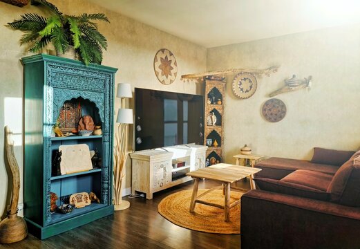 Un salon compos&eacute; de d&eacute;coration et meubles ethnique