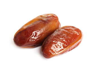 Two tasty sweet dried dates on white background