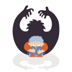 A person experiences fear. He sits huddled and afraid.