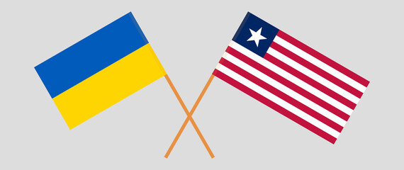 Crossed flags of Ukraine and Liberia. Official colors. Correct proportion
