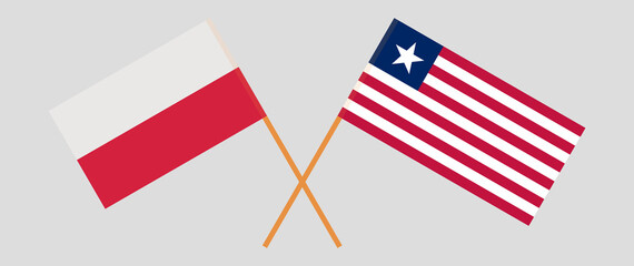 Crossed flags of Poland and Liberia. Official colors. Correct proportion