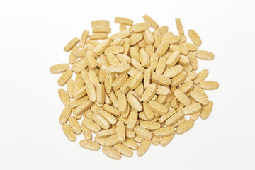 Top view scattered medicine isolated at white background. Pills as decease preventions. Vitamins and healthy lifestyle.