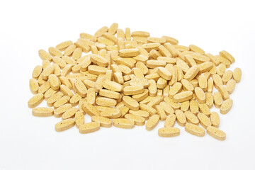 Heap of medicine isolated at white background. Pills as decease preventions. Vitamins and healthy lifestyle.