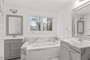 Luxury mansion master bathroom tub and windows