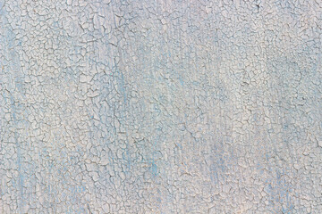 cracked paint on blue wall, dry cracked paint texture, use as background