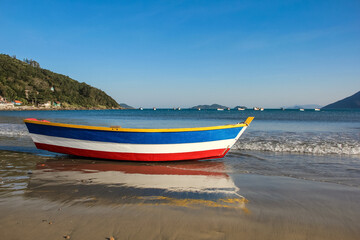 Colorful boat on the seashore. South of Brazil