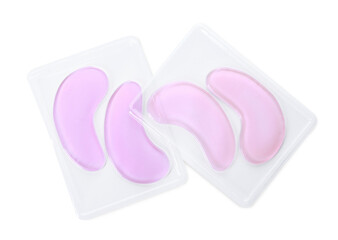 Packages with under eye patches isolated on white, top view. Cosmetic product