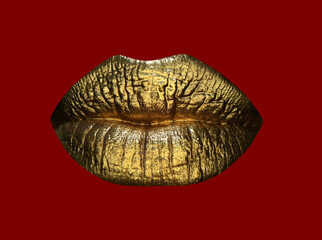 Luxury gold lips make-up. Golden lips with golden lipstick. Gold paint on lips of sexy girl. Sensual woman mouth, isolated background. Female gold glitter lipstick. Isolated on red.