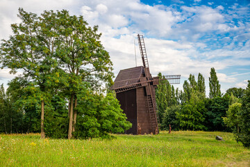Fototapeta na wymiar Smigiel, Poland - August 08, 2021. Old wooden mill in Smigiel - Smigielskie Wiatraki