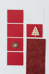 christmas tree and starburst (or flower) on red paper squares