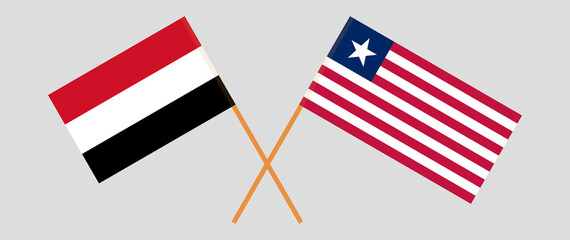 Crossed flags of Yemen and Liberia. Official colors. Correct proportion