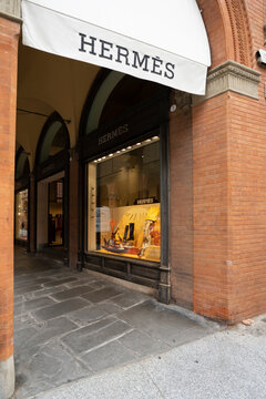 Bologna Italy. October 2021.  the shop windows of the Hermes brand under a portico in the city center