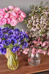 Set of white, pink and magenta flowers for Interior decorations. The work of the florist at a flower shop. Fresh cut flower.