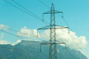 Oberriet, Switzerland, June 13, 2021 Power pole station in an alpine scenery