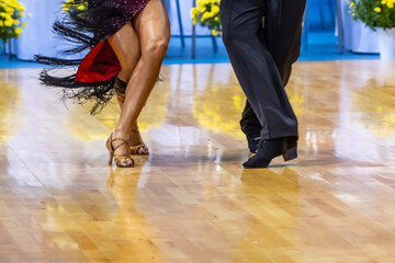 Woman and man dancing latin program. International competition.