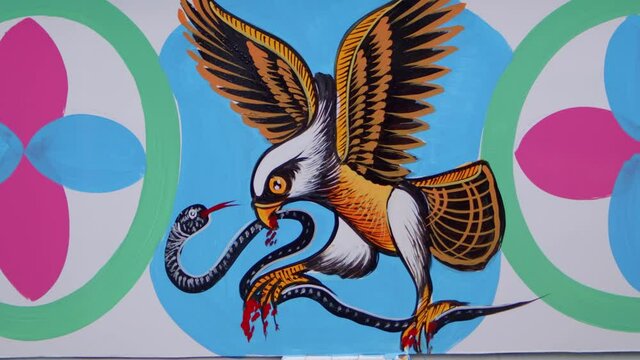 Close-up of finished eagle painting on a truck side