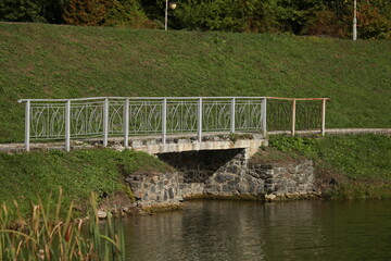 Small bridge across the river in the park