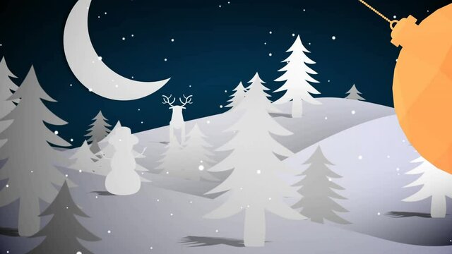 Animation of christmas snow falling over bauble in winter landscape