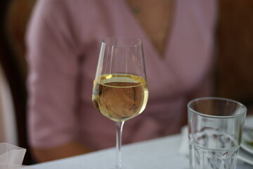 a glass of champagne on the table