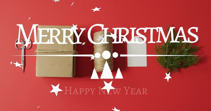 Animation of merry christmas greetings text over christmas decorations