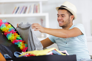 man preparing for travel vacation