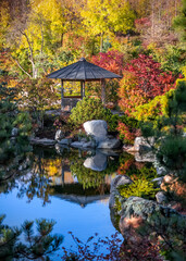 A small pavilion at Japanes garden in Frederik Meijer gardens , Grand rapids, Michigan surrounded...