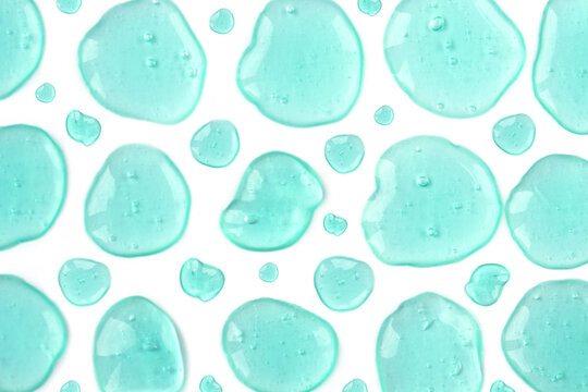 Mint blue doses of acid, hyaluronic moisturizing serum or gel isolated on white background. Abstract backdrop pattern. Beauty product wallpaper. Cosmetics or healthcare protection concept. 