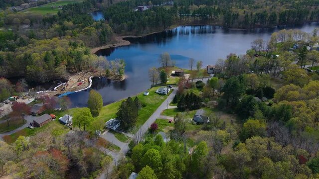 Tyngsborough historic town center and Flint Pond aerial view in spring in Tyngsborough, Massachusetts MA, USA.