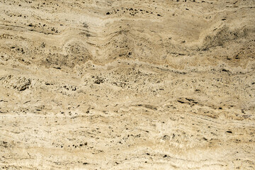 Close up of an abstract concrete natural stone tile on the wall. Aged wall with. textured background