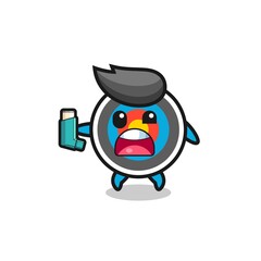 Obraz premium target archery mascot having asthma while holding the inhaler