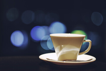 コーヒーカップと夜景