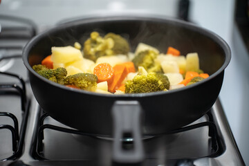 healthy food. macro photography of broccoli, carrots and potatoes. image with blurred space for copy.