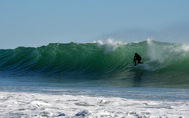 Surfer Entering the Curl of a Wave at Rincon Beach, California