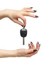 A female hand with a black nails manicure holds a black car key with her fingers. Isolated on white background.