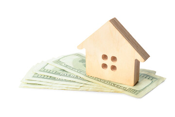 Wooden house and money on white background