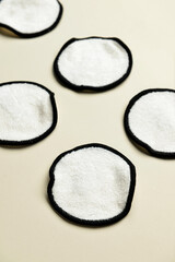 Reusable cotton pads on light background