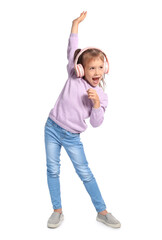 Funny little girl listening to music and singing on white background