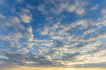 evening clouds in the blue sky