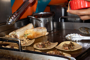 cooking tacos with meat (mexican food)