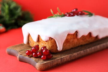 Board with tasty Christmas bread on color background