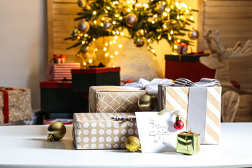 Beautiful Christmas gifts on table in room