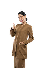 Smiling young civil servant woman standing with thumbs up
