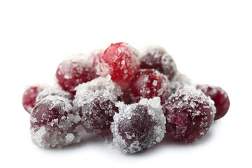 Tasty sugared cranberries on white background
