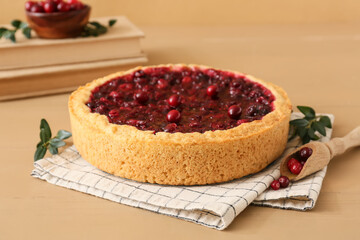 Delicious lingonberry pie on table